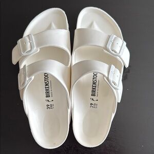 Birkenstock White Sandals with Textured Straps and Molded Sole